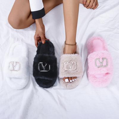 China 2021 anti-skid autumn and winter indoor and outdoor hairy slippers wholesale women's furry slippers warmth for sale