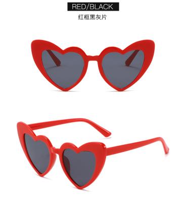 China Four Seasons sunglasses shape heart sunglasses big frame personality glass metal hinge wholesale for sale