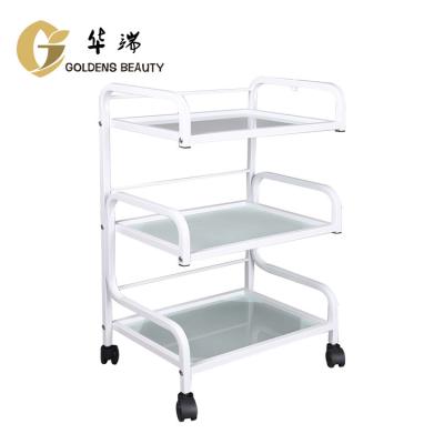 China Modern Beauty Salon Cart With 3 Frosted Glass Shelves And Bar Guard for sale