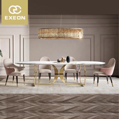 China Metal Stainless Steel Marble Top Leg Dining Tables Sets Modern Luxury Stone Stainless Steel Diningroomsets With Chairs for sale