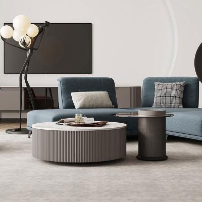 China Modern Light Luxury Designer Stainless Steel Tea Hairstyle Round Coffee Table Rock Panel Living Room Combination for sale