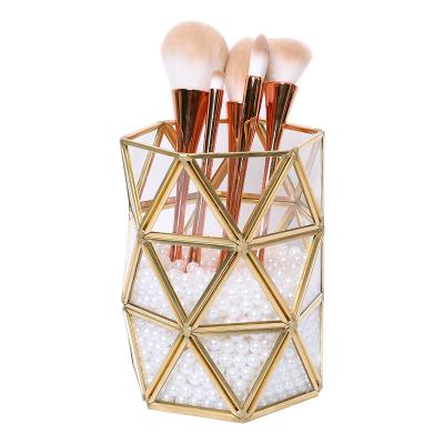 China Viable Creative Geometric Metal Brush Container Eyebrow Pencil Glass Cosmetic Container For Desktop for sale