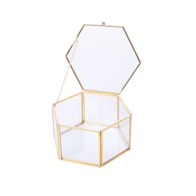 China Custom Retro Gold Glass Jewelry Box Wholesale Hexagonal Transparent Glass Ring Box Custom Flower Home for sale