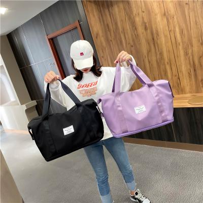 China Lady Foldable Custom Waterproof Travel Bag Fitness Sports Gym Bag for sale