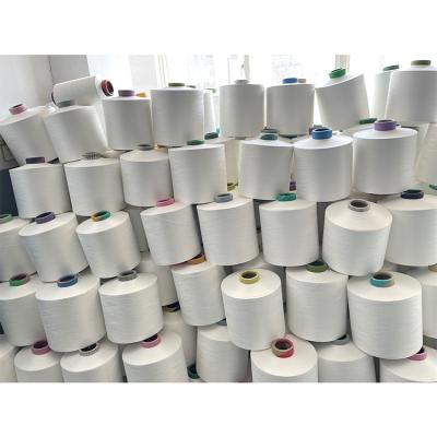 China Sustainable Wholesale Raw White Core Spun Yarn Material DTY Ring Spun 300d Polyester Yarns For Weaving for sale