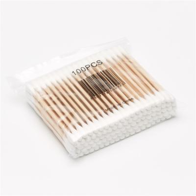 China 100% eco-friendly and easy transport packing cosmetic and health care 100pcs wooden stick individual opp earbuds and cotton swabs for sale