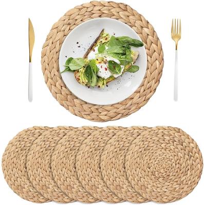 China Sustainable 100% Natural Water Hyacinth Handmade Cup / Bamboo Dinner Round Woven Table Place Mat for sale