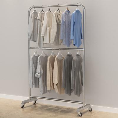 China Simple Design Minimalist Metal Frame Mobile Rack For Comforter for sale