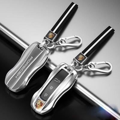 China 2022 Bling Bling Crystal Factory Tempered Glasses 3D Luxury Zinc Alloy Car Remote Smart Key Holder For Porsche for sale