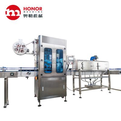 China 0-300BPM Food Water Bottle Beverage Juice Bottle Sleeve Labeling Machine for sale