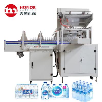 China Food Honor Machine PE Film Shrink Wrapping Wrapping Equipment With Electric Heating Shrink Tunnel Te koop