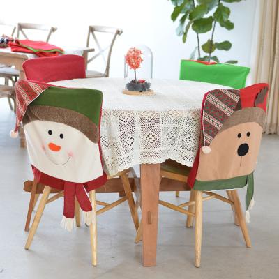 China Simple Christmas Chair Back Covers Elf Design Santa Hat Slipcovers Decoration Xmas Chair Covers for Christmas Party Home Dinner for sale