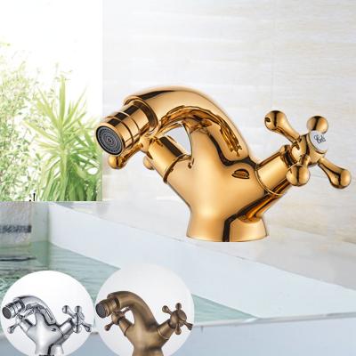 China Faucets Gold Metered Bidet Faucet For Lady Cleaning Water Bathroom Sink Brass Single Hole Double Handle Deck Installed Water Mixing Faucet for sale