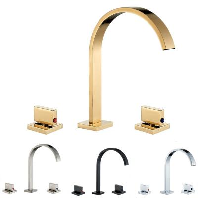 China Metered Faucets Black Gold Bathroom Basin Faucet Hot And Cold Water Faucet Widespread Double Handle Mixers Tap Deck Mount Wash Tub Fauctes for sale