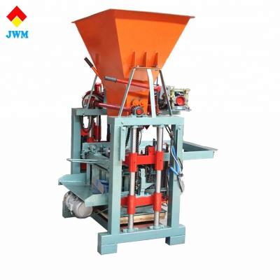 China Building Material Stores Low Price Brick Block Interlocking Machine In Kenya Manual Concrete Block Machine Making for sale