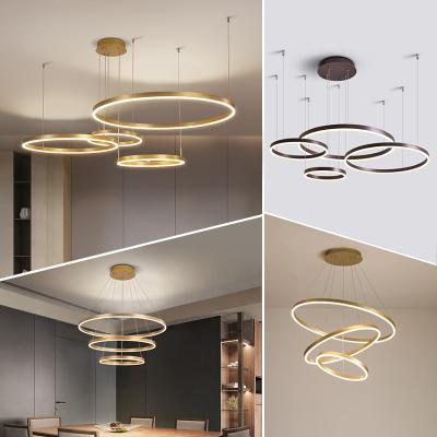 China LED Pendant Hanging Simple Hot Sale Simple Hanging Luxury Gold Circle Rings Ceiling Lights Modern Chandelier Decorative Living Room Pendant for sale