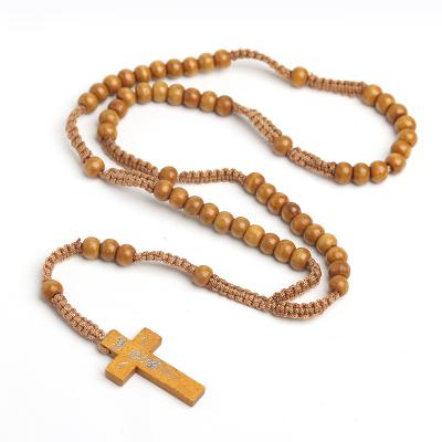 China High Quality Nature Jesus Rosary Necklace Handmade Braided Wooden Beaded Cross Pendant Necklace for sale