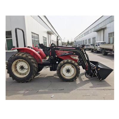 China Cultivates Farm Equipment Agricultural Yannmar 704 Used Farm Tractor With Attachments Front Loader for sale