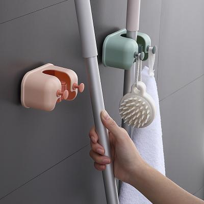 China 2021 Modern Nordic Style New Fashion Hit Color Broom Seamless Hook Wall Mount Card Holder Broom Training Hook Nail Free Holder for sale