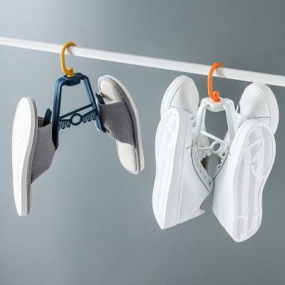 China 2021 new viable creative simple multi-function shoe drying rack balcony rotating shoe drying double hook outdoor shoe drying rack for sale