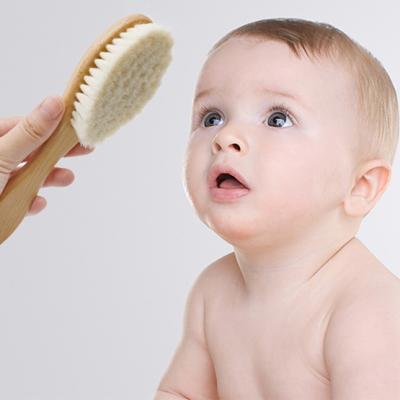 China Wooden Cushion Baby Hair Brush Bottle Baby Brush With Natural Goat Hair Straightens Infant Hair for sale