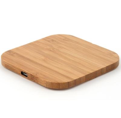 China Dropshipping Smart Creative Custom Bamboo Wood Fast Wireless Charging Mobile Phone Fast Radio Qi Charging Mobile Phone for sale