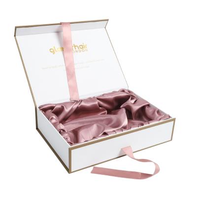 China Handmade Magnetic Closure White And Gold Satin Lined Paper Gift Boxes With Custom Ribbon Bow for sale