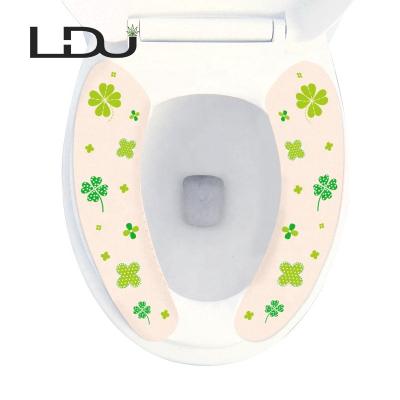 China Durable Four Leaf Clover Pattern Water Absorption Non-Slippery Toilet Seat Cover for sale