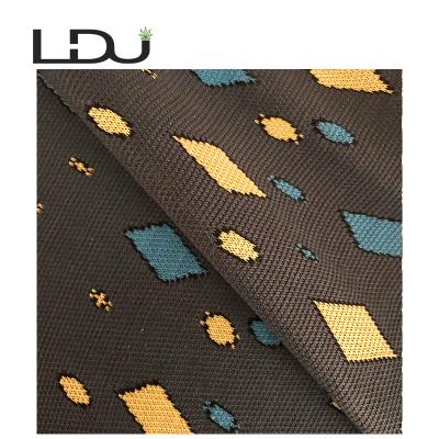 China Anti Static Screen Printing Car Fabric Embossed Car Fabric For Upholstery Bus Seat for sale