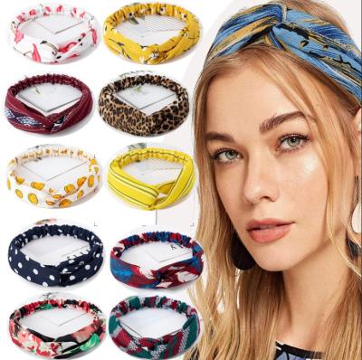 China 2021 new retro polka dot print sporty wide-brimmed cross flower simple soft elastic headband for sale