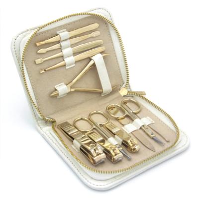 China Gold Scissors Custom Stainless Steel Manicure Pedicure Set Gold Nail Clippers Grooming Kit Nail Tools White PU Leather Case for sale