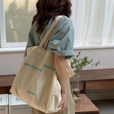 China Durable wholesale custom printed cheap reusable logo tote cotton canvas bag for woman for sale