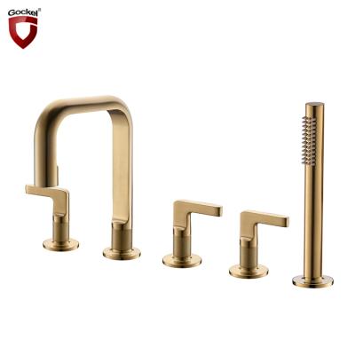 China Luxury No Holes Slide Bar Five Gold Deck Mounted Brass Bathroom Tub Faucet and Shower Mixer Tap Faucet Set for sale