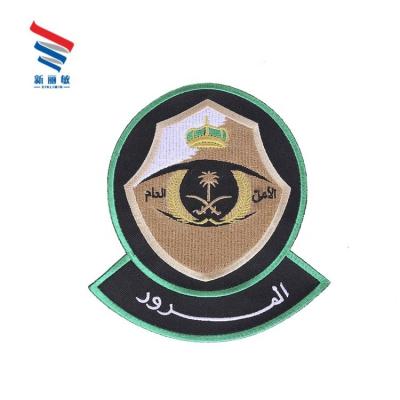 China Custom iron on twill heat cut eye embroidery patch for garment accessory for sale