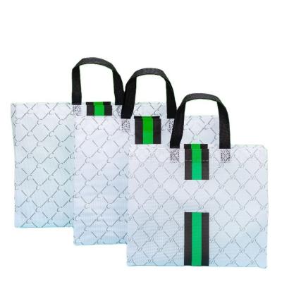 China Foldable Non-woven Shopping Tote Bag Custom Packaging with Logo Portable Carrier for sale