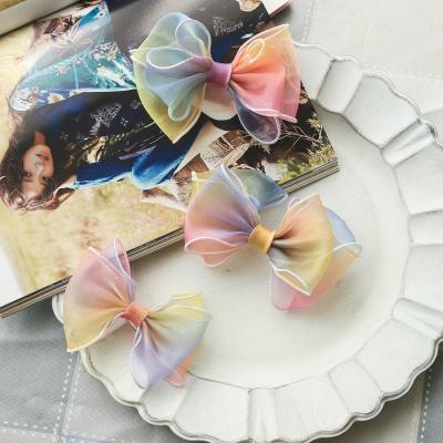 China Gradient Curling Wave Edge Satin Fabric Rainbow Handmade Bow Ribbon Flowers Children's Hair Clip for sale