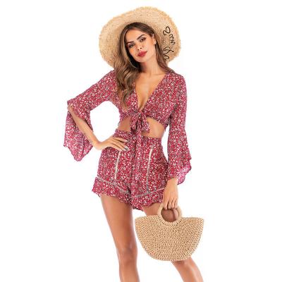 China Women's Summer Breathable V-Neck Flared Sleeve Sexy Fashion 2 Piece Set Women Vacation Style Floral Crop Top Women Suit for sale