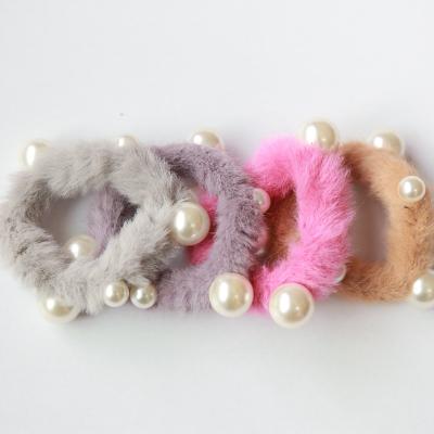 China Large Intestine Ring Faux Fur Ponytail Scrunchies Ring Elastic Rope Band Lovely Girls Pearl Head Plush Hair Scrunchies Women Headband New for sale