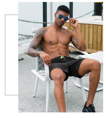 China Ljvogues Men's Breathable Beach Pants Outdoor Sports Summer Casual Capris Fitness Running Loose Quick Drying Shorts for sale