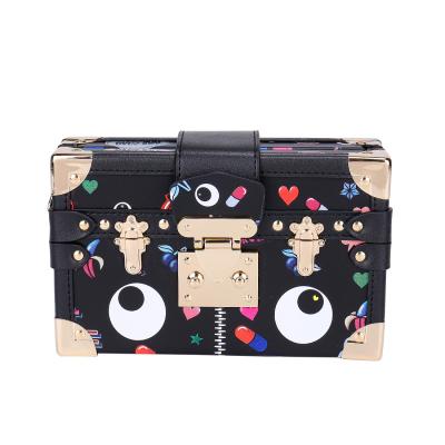 China Fashion personality print fashion personality graffiti eye cross handbag lady chain lock mini bag box hand painted small square shoulder bag one for sale