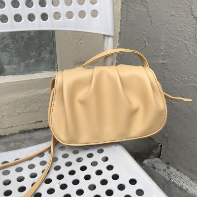 China Dating saddle bag female cloud shape PU good quality simple cross - body bag young fairy fold shoulder bag for sale