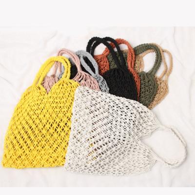 China Summer hot hollow mesh woven bag holiday cotton beach bag lady CIA grid fashion promotion bag weaver handmade rope handbag for women for sale