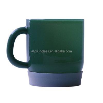 China Sustainable Heat Resistant Borosilicate Glass Cups Green Jade Glass Mugs with Silicone Base for sale