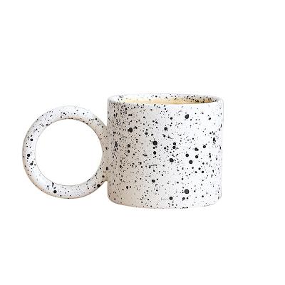 China Large Ear Water Cup Ink Splatter White Ceramic Cup Sustainable Handheld Creative Stoneware Mug for sale