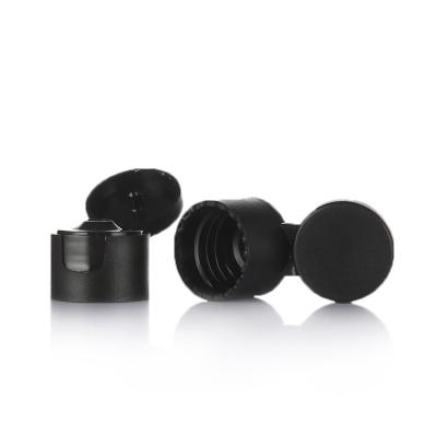 China Non Spill Factory Price PP Material 18mm Tube Top Cap Black Plastic Shampoo Flip Cap Plastic Flip Cap for sale