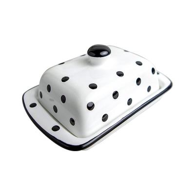 China Viable Wholesale Design Decoration Cute Porcelain Cow Stain Ceramic Butter Dish With Cover for sale