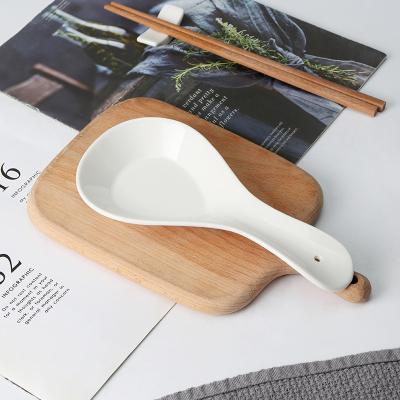 China Sustainable Custom Kitchen Cooking Ceramic Spoon Rest Utensil Holder Porcelain Pocket Spoon Rest For Counter Stove Top for sale