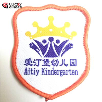 China Wholesale 3D Iron On Custom Uniform Name Logo Woven Sports Fabric Patches And Badges For Fabric for sale