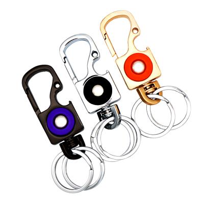 China Multifunctional Bottle Opener Beer Car Man Metal Key Chain with Two Key Rings for sale