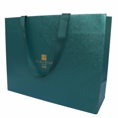 China Low Price Eco - Friendly Wholesale Tote Handbag Custom Design Paper Packaging Bags for sale